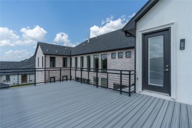 Welcome to a glorious modern residence nestled behind the gates on Oak Tree National Golf and Country Club in Oklahoma - for sale on GolfHomes.com, golf home, golf lot