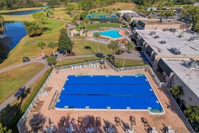 Welcome to 3454 Niblick Court, a beautifully maintained end-unit on Seven Springs Golf and Country Club in Florida - for sale on GolfHomes.com, golf home, golf lot