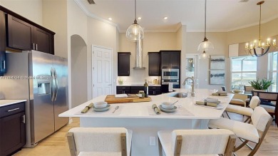 This stunning home boasts panoramic views of the lake and golf on Panther Run Golf Club in Florida - for sale on GolfHomes.com, golf home, golf lot