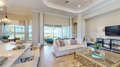This stunning home boasts panoramic views of the lake and golf on Panther Run Golf Club in Florida - for sale on GolfHomes.com, golf home, golf lot