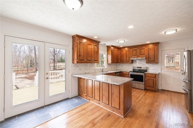 Experience refined elegance in this remodeled 3-bedroom, 2 on The Brookwoods Golf Club in Virginia - for sale on GolfHomes.com, golf home, golf lot