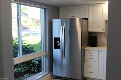 Enjoy the very best of Naples Florida in this sought after first on The Glades Golf and Country Club in Florida - for sale on GolfHomes.com, golf home, golf lot