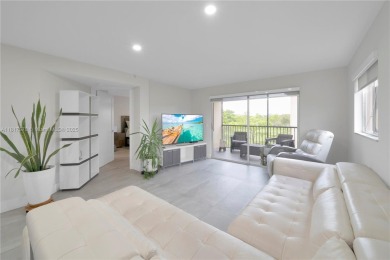 The largest 2-bed, 2-bath corner apartment in the building on Flamingo Lakes Country Club in Florida - for sale on GolfHomes.com, golf home, golf lot