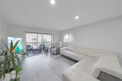 The largest 2-bed, 2-bath corner apartment in the building on Flamingo Lakes Country Club in Florida - for sale on GolfHomes.com, golf home, golf lot