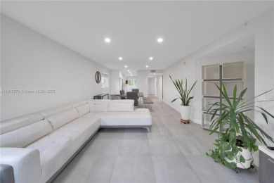The largest 2-bed, 2-bath corner apartment in the building on Flamingo Lakes Country Club in Florida - for sale on GolfHomes.com, golf home, golf lot