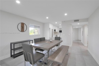 The largest 2-bed, 2-bath corner apartment in the building on Flamingo Lakes Country Club in Florida - for sale on GolfHomes.com, golf home, golf lot