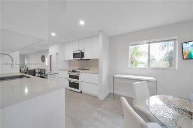 The largest 2-bed, 2-bath corner apartment in the building on Flamingo Lakes Country Club in Florida - for sale on GolfHomes.com, golf home, golf lot