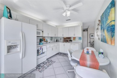 This spacious 3/2 condo in Cypress at Woodmont, offering 1,792 on Woodmont Country Club in Florida - for sale on GolfHomes.com, golf home, golf lot