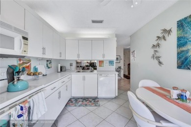 This spacious 3/2 condo in Cypress at Woodmont, offering 1,792 on Woodmont Country Club in Florida - for sale on GolfHomes.com, golf home, golf lot