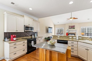 Do not miss this bright, airy, open-concept home in picturesque on Sea Trail Golf Resort in North Carolina - for sale on GolfHomes.com, golf home, golf lot