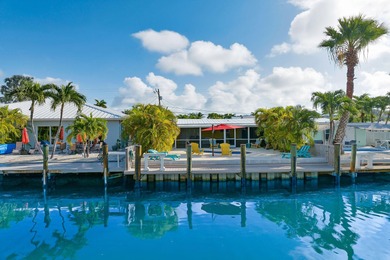 Experience the best of Keys living in this immaculate 2-bedroom on Key Colony Beach Golf Course in Florida - for sale on GolfHomes.com, golf home, golf lot