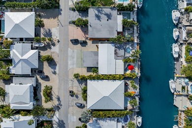 Experience the best of Keys living in this immaculate 2-bedroom on Key Colony Beach Golf Course in Florida - for sale on GolfHomes.com, golf home, golf lot