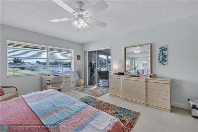 This spacious 3/2 condo in Cypress at Woodmont, offering 1,792 on Woodmont Country Club in Florida - for sale on GolfHomes.com, golf home, golf lot