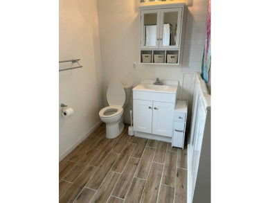 Nestled on a somewhat private lot in the 55+ Class A gated RV on Deer Creek RV Golf Resort in Florida - for sale on GolfHomes.com, golf home, golf lot
