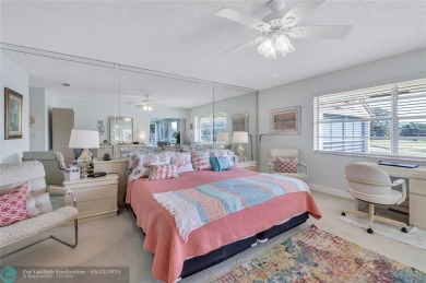 This spacious 3/2 condo in Cypress at Woodmont, offering 1,792 on Woodmont Country Club in Florida - for sale on GolfHomes.com, golf home, golf lot