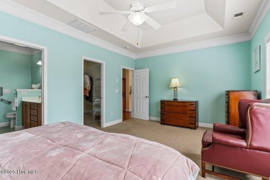 Do not miss this bright, airy, open-concept home in picturesque on Sea Trail Golf Resort in North Carolina - for sale on GolfHomes.com, golf home, golf lot