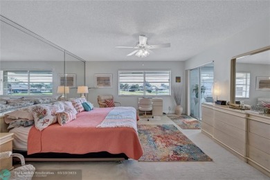 This spacious 3/2 condo in Cypress at Woodmont, offering 1,792 on Woodmont Country Club in Florida - for sale on GolfHomes.com, golf home, golf lot