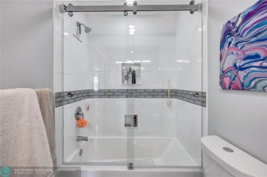 This spacious 3/2 condo in Cypress at Woodmont, offering 1,792 on Woodmont Country Club in Florida - for sale on GolfHomes.com, golf home, golf lot