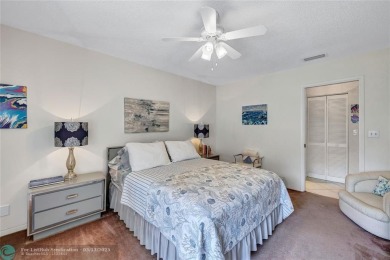 This spacious 3/2 condo in Cypress at Woodmont, offering 1,792 on Woodmont Country Club in Florida - for sale on GolfHomes.com, golf home, golf lot