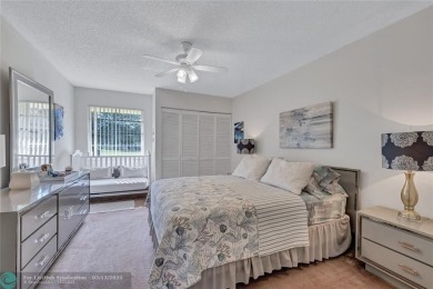 This spacious 3/2 condo in Cypress at Woodmont, offering 1,792 on Woodmont Country Club in Florida - for sale on GolfHomes.com, golf home, golf lot