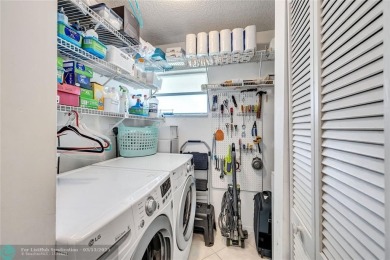 This spacious 3/2 condo in Cypress at Woodmont, offering 1,792 on Woodmont Country Club in Florida - for sale on GolfHomes.com, golf home, golf lot