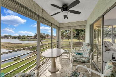 This spacious 3/2 condo in Cypress at Woodmont, offering 1,792 on Woodmont Country Club in Florida - for sale on GolfHomes.com, golf home, golf lot