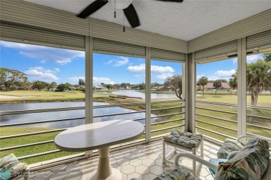 This spacious 3/2 condo in Cypress at Woodmont, offering 1,792 on Woodmont Country Club in Florida - for sale on GolfHomes.com, golf home, golf lot