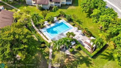 This spacious 3/2 condo in Cypress at Woodmont, offering 1,792 on Woodmont Country Club in Florida - for sale on GolfHomes.com, golf home, golf lot
