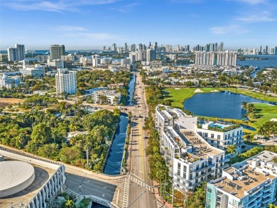 This meticulously renovated unit is truly one of a kind on Miami Beach Golf Club in Florida - for sale on GolfHomes.com, golf home, golf lot