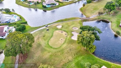 This spacious 3/2 condo in Cypress at Woodmont, offering 1,792 on Woodmont Country Club in Florida - for sale on GolfHomes.com, golf home, golf lot