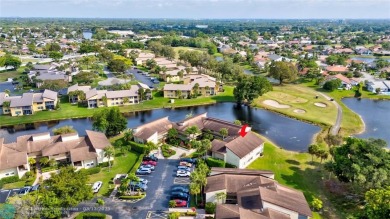 This spacious 3/2 condo in Cypress at Woodmont, offering 1,792 on Woodmont Country Club in Florida - for sale on GolfHomes.com, golf home, golf lot