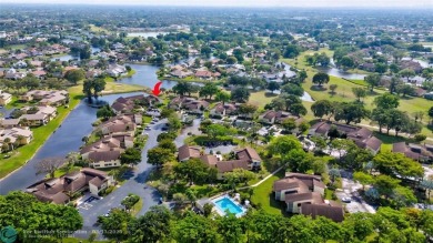 This spacious 3/2 condo in Cypress at Woodmont, offering 1,792 on Woodmont Country Club in Florida - for sale on GolfHomes.com, golf home, golf lot