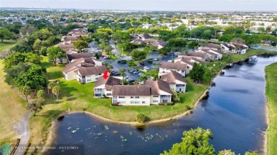 This spacious 3/2 condo in Cypress at Woodmont, offering 1,792 on Woodmont Country Club in Florida - for sale on GolfHomes.com, golf home, golf lot