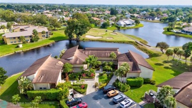 This spacious 3/2 condo in Cypress at Woodmont, offering 1,792 on Woodmont Country Club in Florida - for sale on GolfHomes.com, golf home, golf lot