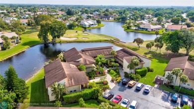 This spacious 3/2 condo in Cypress at Woodmont, offering 1,792 on Woodmont Country Club in Florida - for sale on GolfHomes.com, golf home, golf lot