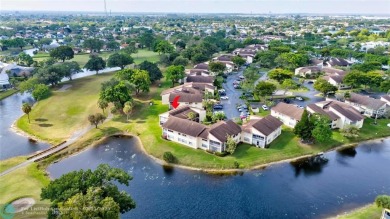 This spacious 3/2 condo in Cypress at Woodmont, offering 1,792 on Woodmont Country Club in Florida - for sale on GolfHomes.com, golf home, golf lot