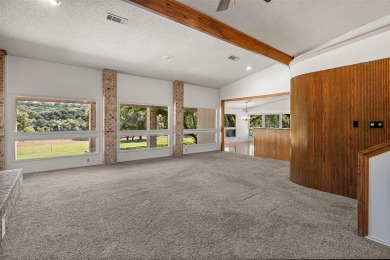 GREAT OPPORTUNITY TO TRANSFORM this rambling, 3,596 SF modern on Pecan Plantation Country Club in Texas - for sale on GolfHomes.com, golf home, golf lot