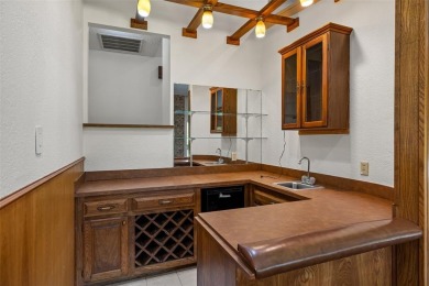 GREAT OPPORTUNITY TO TRANSFORM this rambling, 3,596 SF modern on Pecan Plantation Country Club in Texas - for sale on GolfHomes.com, golf home, golf lot