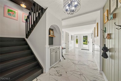 Panoramic lake and golf course views from this elegant island on The Dunes Golf and Tennis Club in Florida - for sale on GolfHomes.com, golf home, golf lot