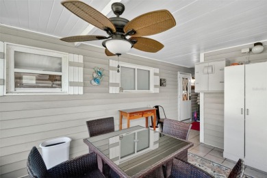 THIS CHARMING 2-bedroom, 2-bath mobile home is nestled in the on Bay Tree Golf Course in Florida - for sale on GolfHomes.com, golf home, golf lot