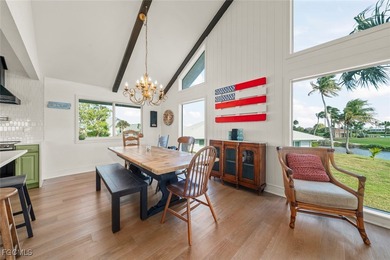 Panoramic lake and golf course views from this elegant island on The Dunes Golf and Tennis Club in Florida - for sale on GolfHomes.com, golf home, golf lot