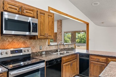 GREAT OPPORTUNITY TO TRANSFORM this rambling, 3,596 SF modern on Pecan Plantation Country Club in Texas - for sale on GolfHomes.com, golf home, golf lot