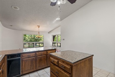 GREAT OPPORTUNITY TO TRANSFORM this rambling, 3,596 SF modern on Pecan Plantation Country Club in Texas - for sale on GolfHomes.com, golf home, golf lot
