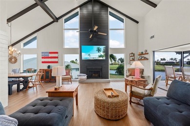 Panoramic lake and golf course views from this elegant island on The Dunes Golf and Tennis Club in Florida - for sale on GolfHomes.com, golf home, golf lot