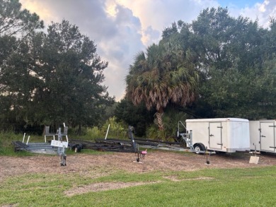 THIS CHARMING 2-bedroom, 2-bath mobile home is nestled in the on Bay Tree Golf Course in Florida - for sale on GolfHomes.com, golf home, golf lot
