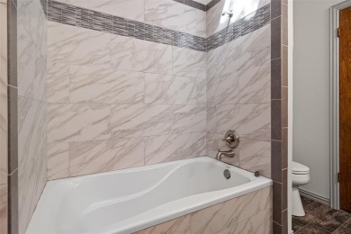 GREAT OPPORTUNITY TO TRANSFORM this rambling, 3,596 SF modern on Pecan Plantation Country Club in Texas - for sale on GolfHomes.com, golf home, golf lot