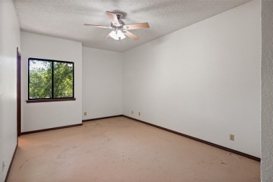 GREAT OPPORTUNITY TO TRANSFORM this rambling, 3,596 SF modern on Pecan Plantation Country Club in Texas - for sale on GolfHomes.com, golf home, golf lot