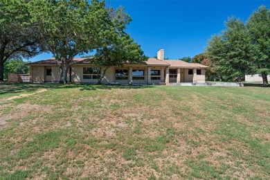 GREAT OPPORTUNITY TO TRANSFORM this rambling, 3,596 SF modern on Pecan Plantation Country Club in Texas - for sale on GolfHomes.com, golf home, golf lot