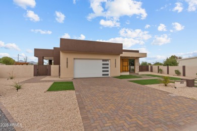 Experience luxury living in this stunning contemporary residence on The Orange Tree Golf Resort in Arizona - for sale on GolfHomes.com, golf home, golf lot