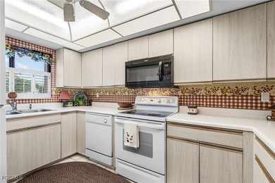 Enjoy great tropical, serene lake and golf views from this on The Landings Yacht, Golf and Tennis Club in Florida - for sale on GolfHomes.com, golf home, golf lot